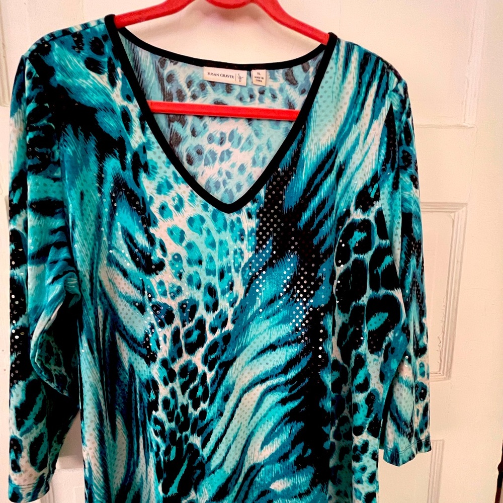 Teal, black and white print tunic.